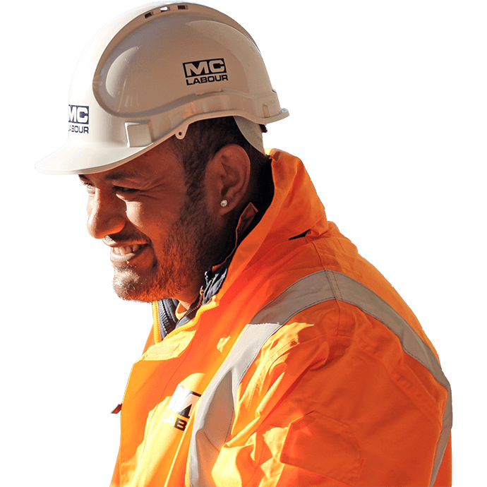 MC Labour worker wearing high viz and a hard hat smiling