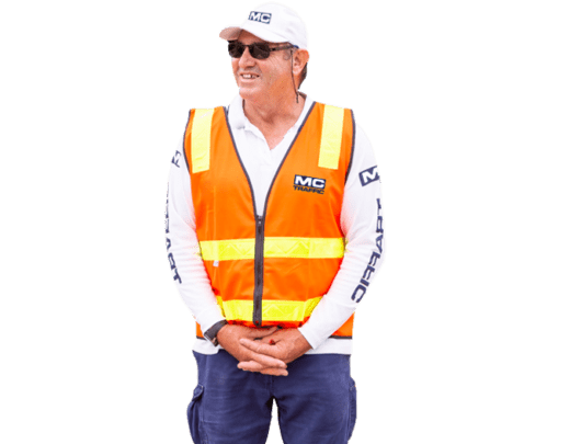Mc traffic worker wearing long sleeves and high viz